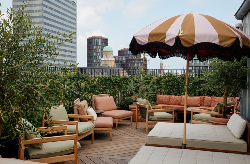 NH_Collection_Copenhagen_Grand_Joanne_terrace_sitting_area_city_view